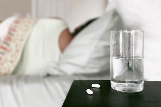 Ailing Woman Rests In Bed