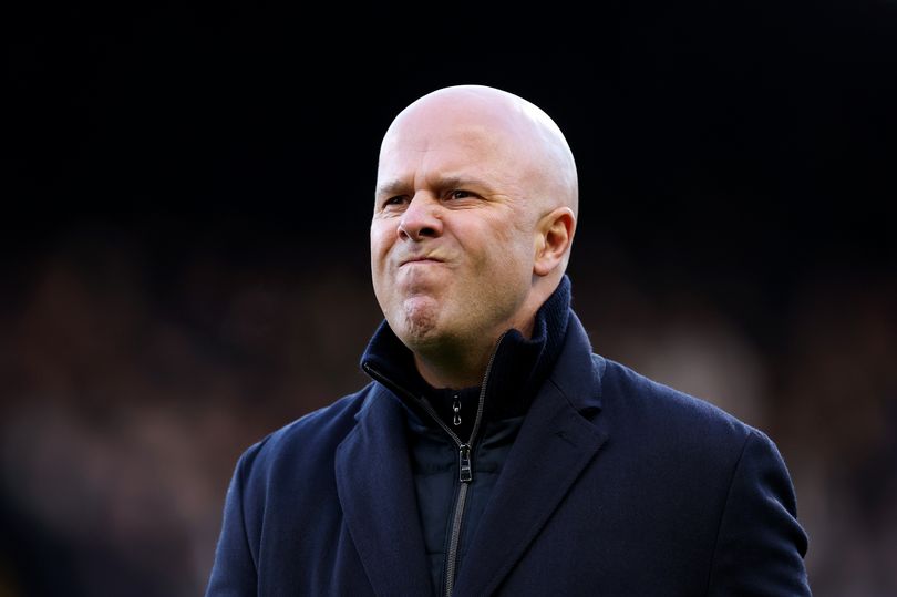 Arne Slot, Manager of Liverpool, looks on with a frustrated face