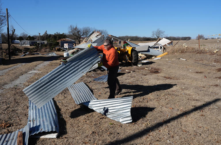 Neighbors sift debris, help each other after suspected Purcell tornado