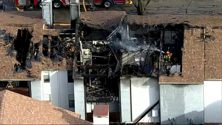Fire crews battle 2-alarm fire at Bedford apartment complex