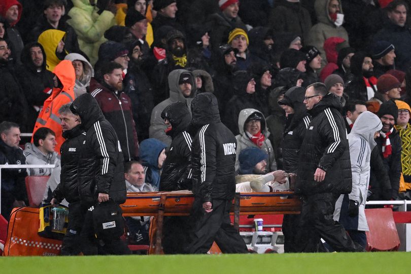 Conor Bradley left the field on a stretcher after suffering a knee injury.