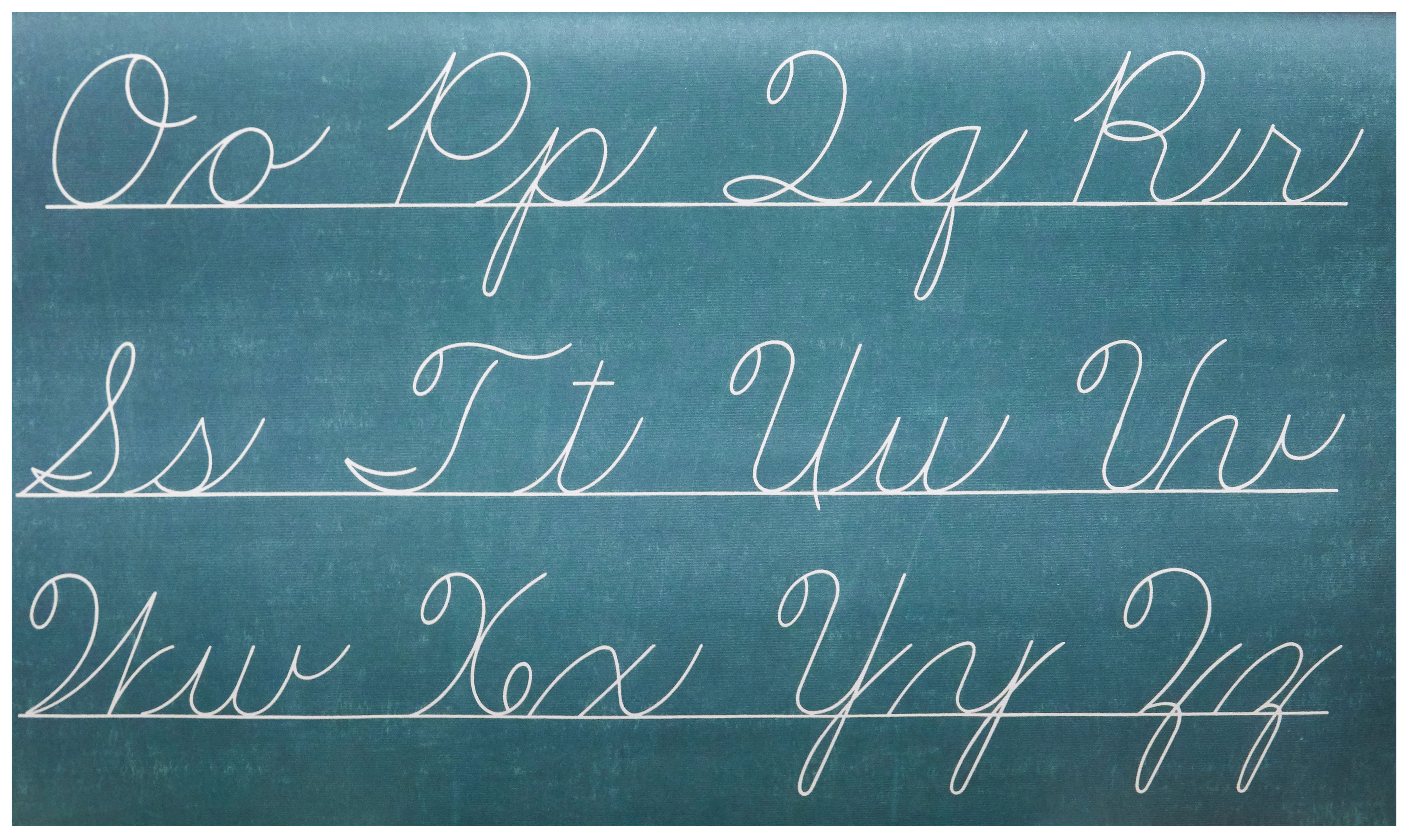 Cursive alphabet letters displayed on a chalkboard, showcasing lowercase letters from 'a' to 'z'