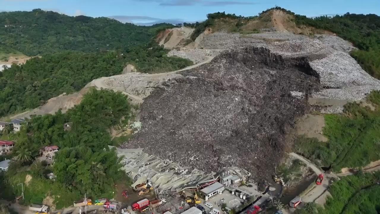 Search for workers buried under garbage after landfill collapse in ...