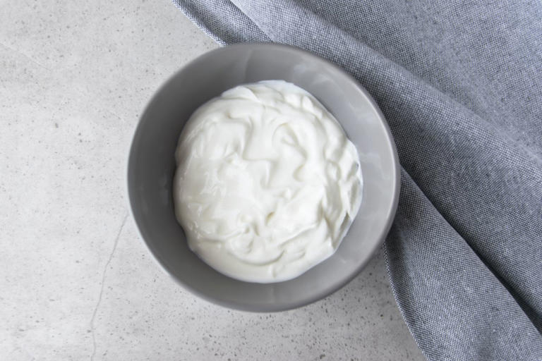 Swap regular yogurt out for low-fat greek yogurt for a lower-calorie option. Credit: Iryna Bauer / Getty Images
