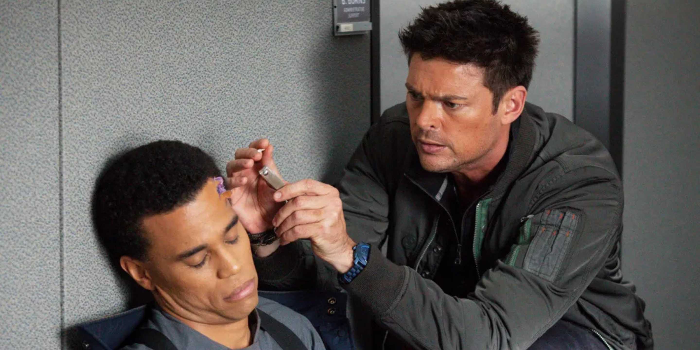 John fixing Dorian in Almost Human