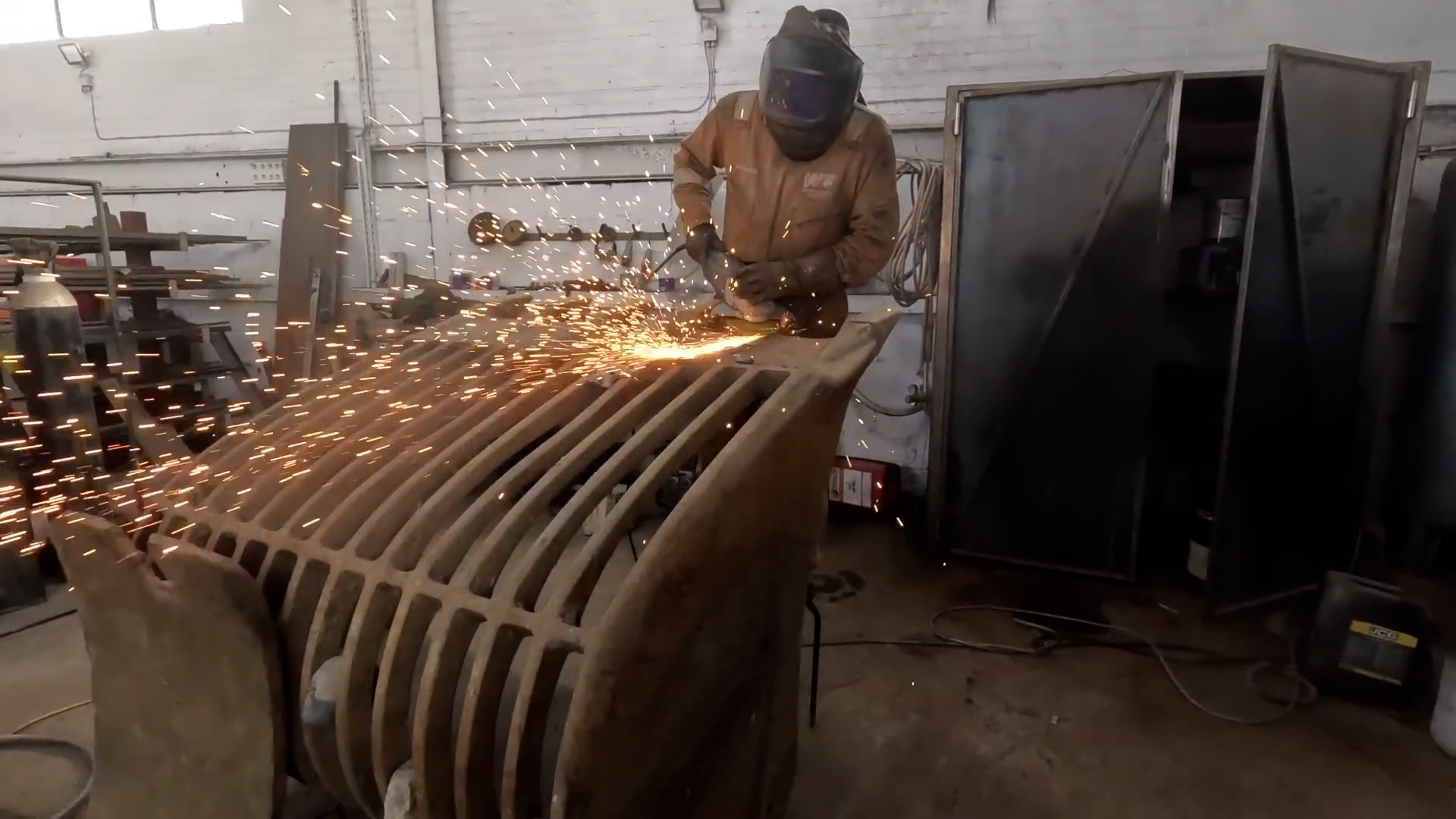 Grinding and finishing heavy bucket repairs