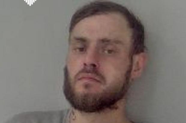 Police urge people to dial 999 if they see wanted man