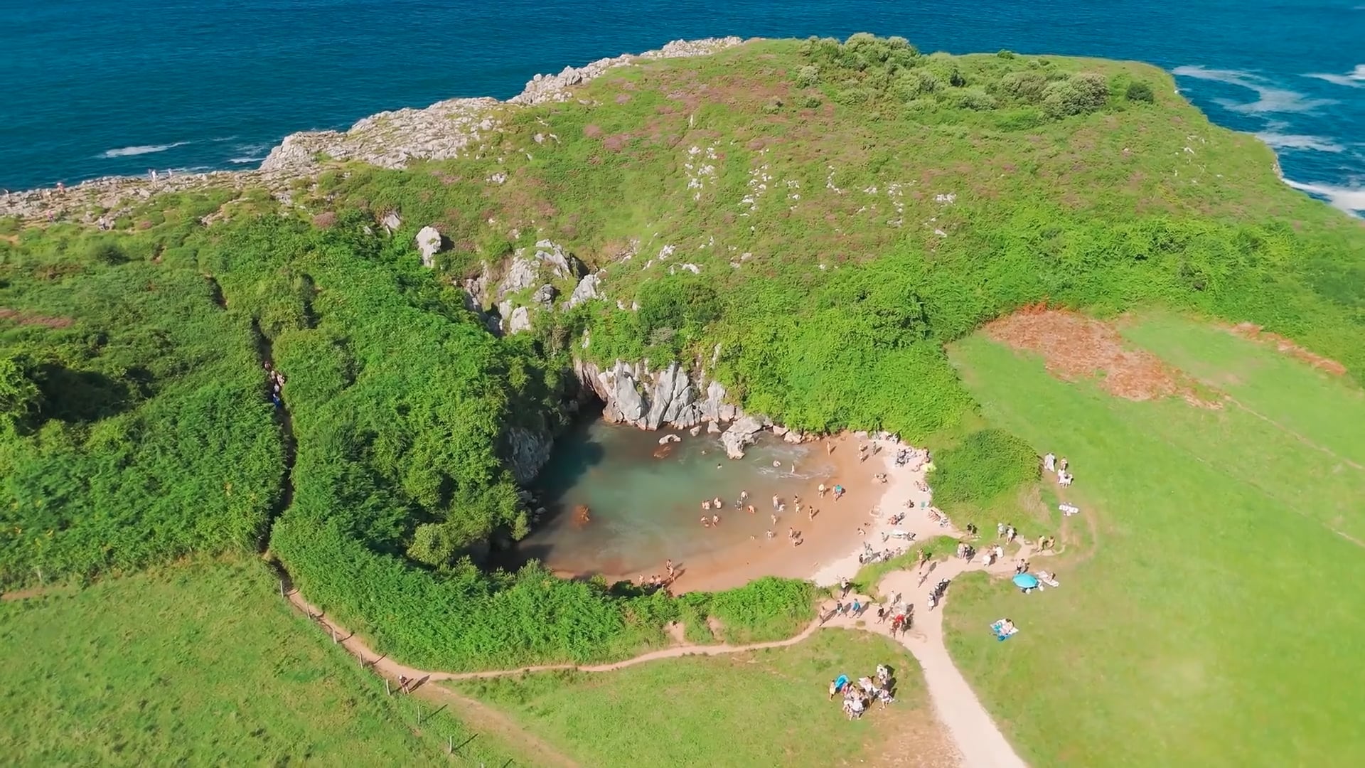 Drone flight over Gulpiyuri Beach: Spain’s smallest inland beach ...