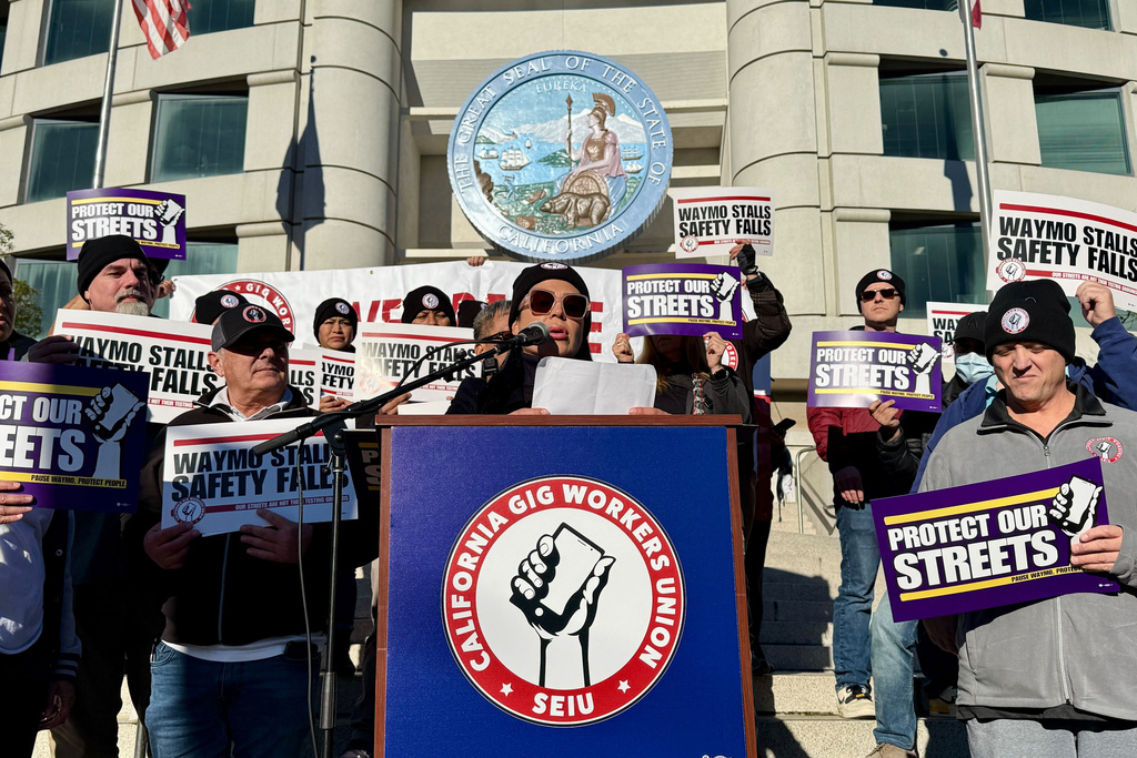 Lyft and Uber drivers protest Waymo robotaxis as California considers ...