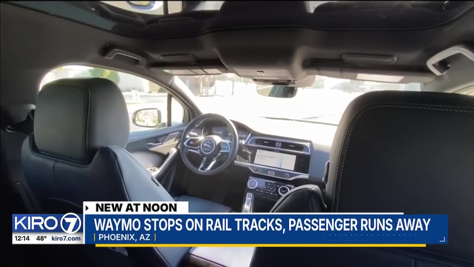 Video: Waymo stops on rail tracks, passenger runs away