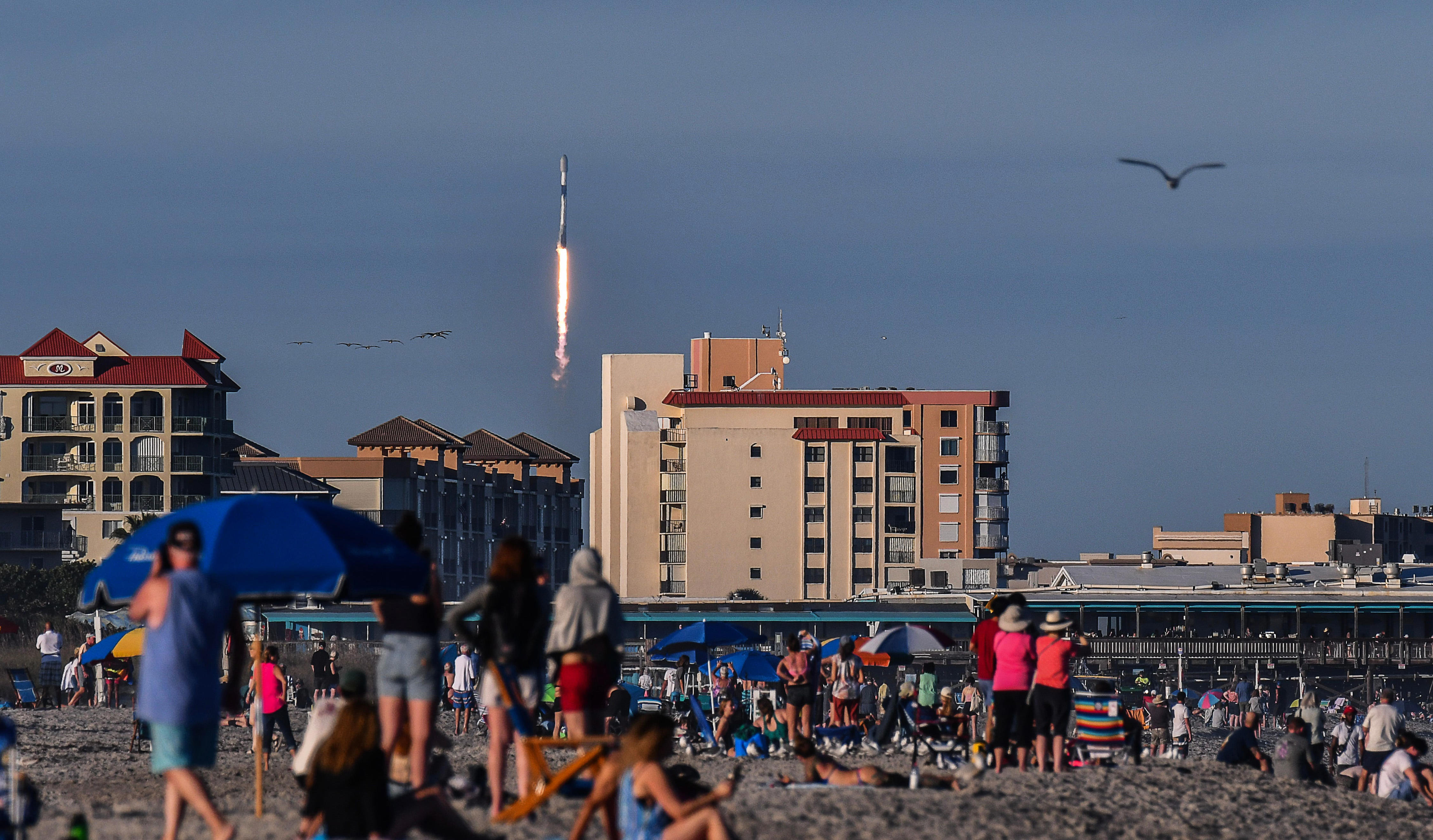 See SpaceX Falcon 9 rocket rise amid sunny skies over Cape Canaveral ...
