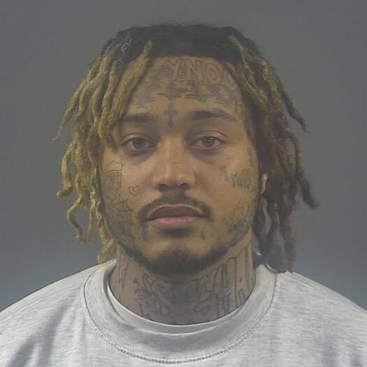 Robbery suspect wanted after fleeing from police during traffic stop