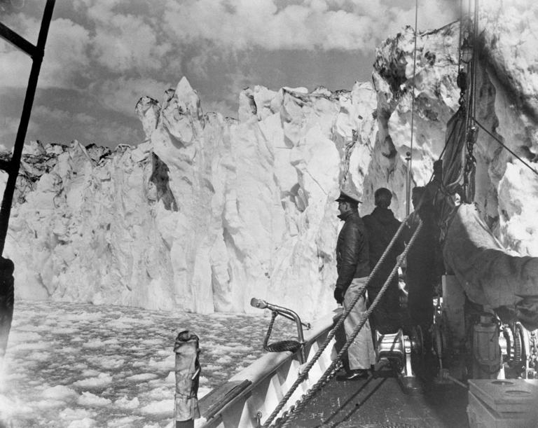 A U.S. Navy vessel sailed past looming icebergs in Greenland, in an undated World War II photo.