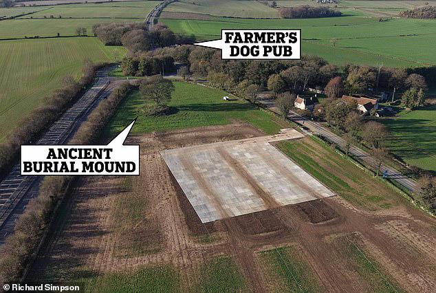 Despite the latest planning victory, there is still a row rumbling over Mr Clarkson leasing a nearby 34-acre field, which he is using as an overflow car park (pictured). The overflow car park is now covered in strengthened aluminium sheets to protect a neighbouring 1,400-year-old burial mound, which contains the remains of an Anglo-Saxon warlord