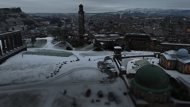 Snow and ice warnings in force as tens of thousands remain without power