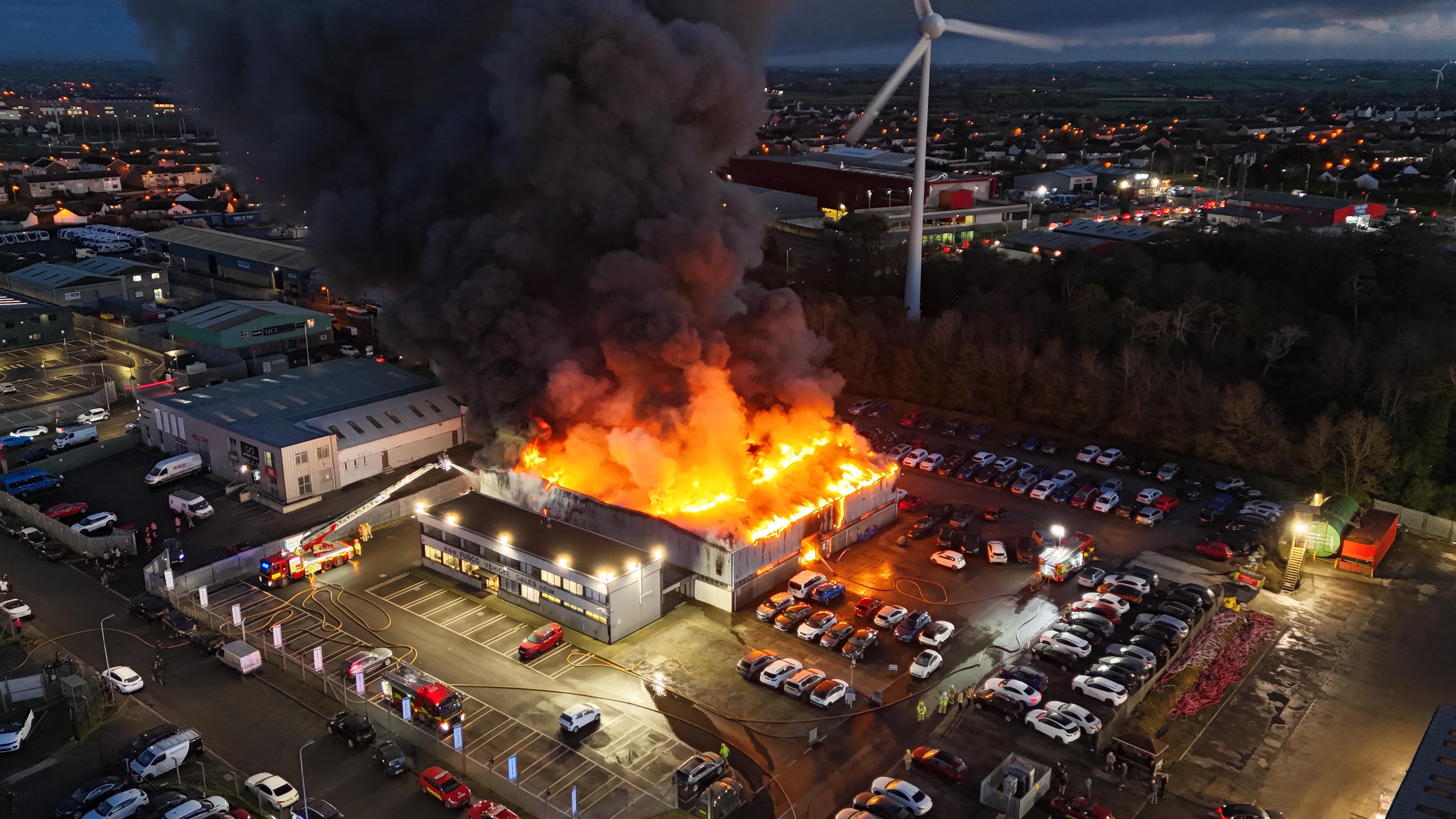 Northern Ireland fire: Drone footage shows thick black smoke billowing ...