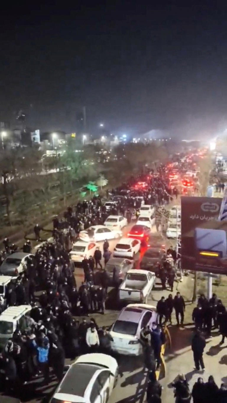 Protesters marching in Mashhad, in an image taken from a social-media video.