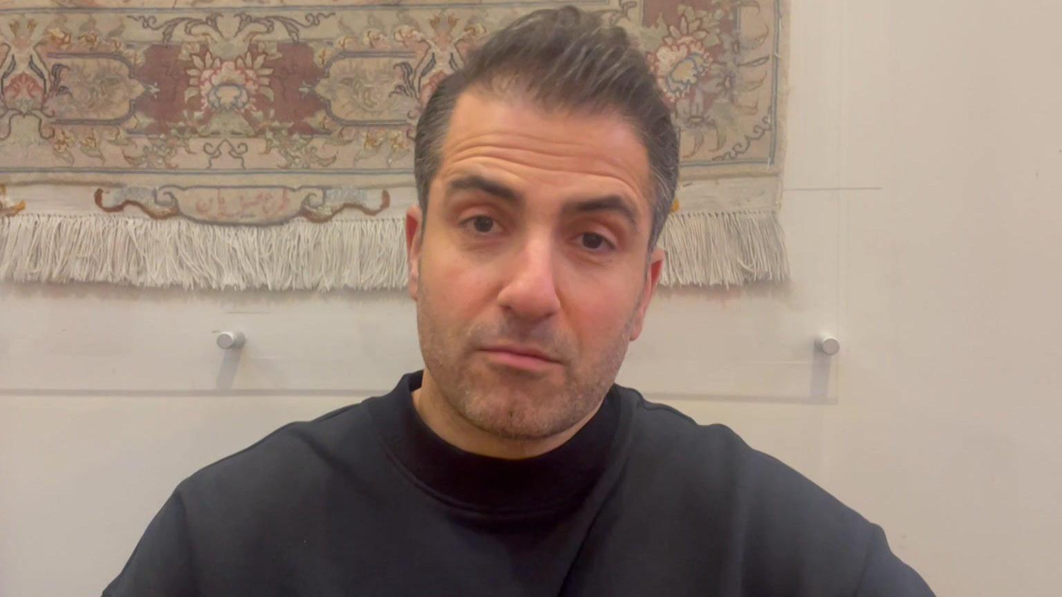 Persian restaurant owner Mohamad says he is stressed because he cannot contact his family