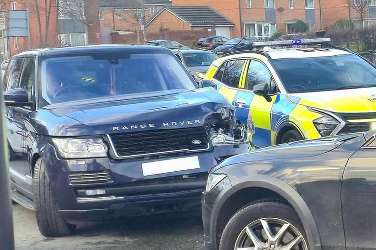 Major junction blocked after car and lorry crash