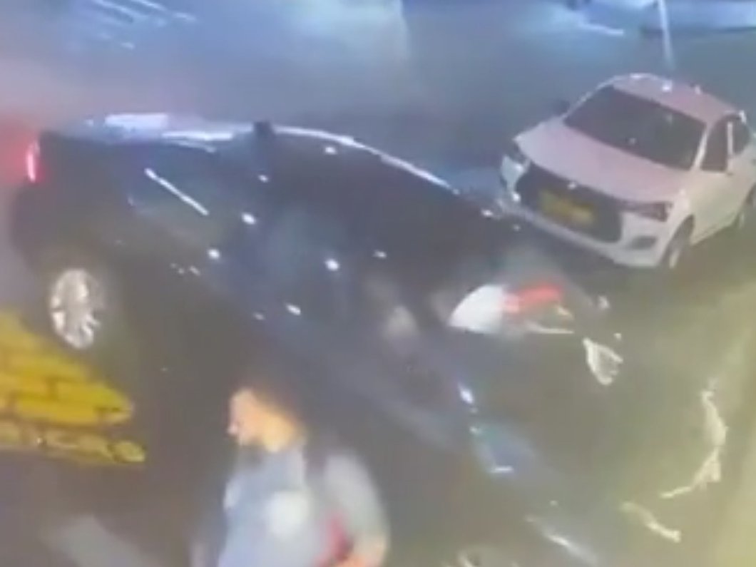 Car crashes into house wall, narrowly missing pedestrians