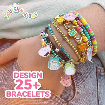 Person's wrist with colorful charm bracelets featuring cute animal designs. Text reads,