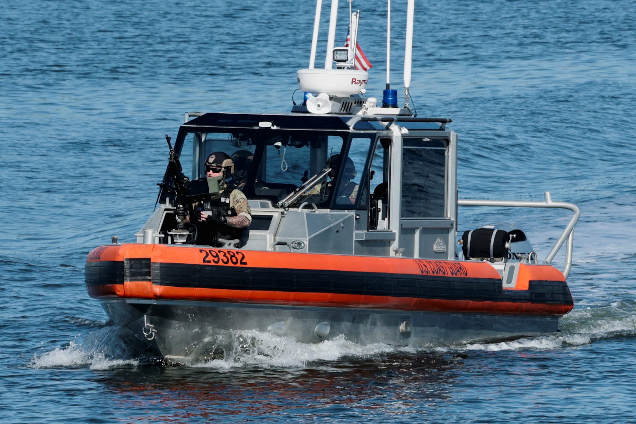 A machine-gun mounted U.S. Coast Guard boat turns away recreational boaters in the water near U.S. President Donald Trump’s Mar-a-Lago club ahead of his meeting with Ukrainian President Volodymyr Zelenskiy at the club in Palm Beach, Florida, U.S., December 28, 2025. REUTERS/Jonathan Ernst