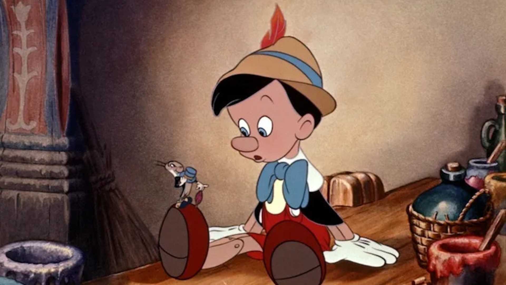 Pinocchio talks to Jiminy in Pinocchio