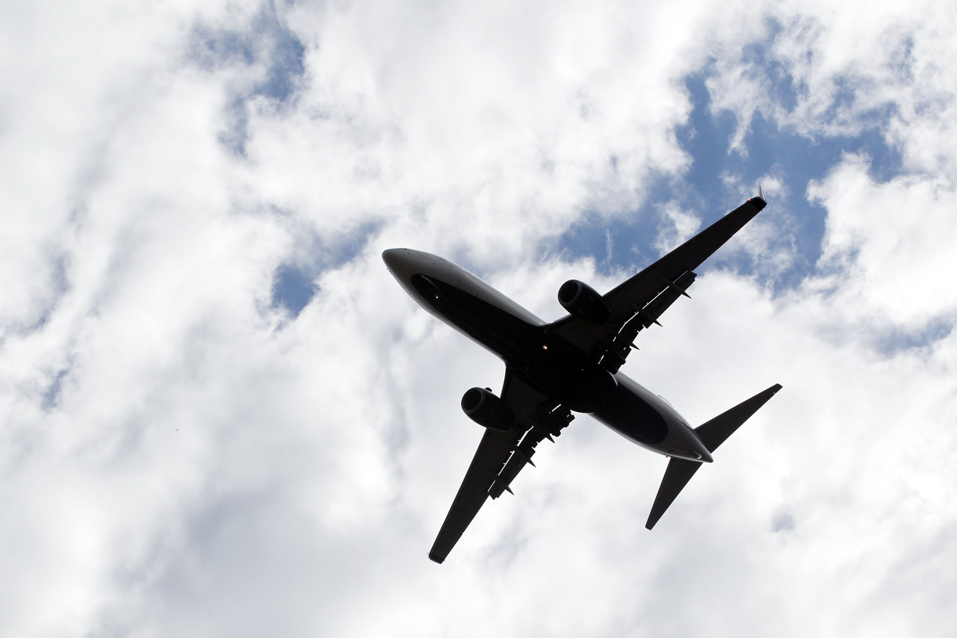 Why do airlines sell too many tickets?