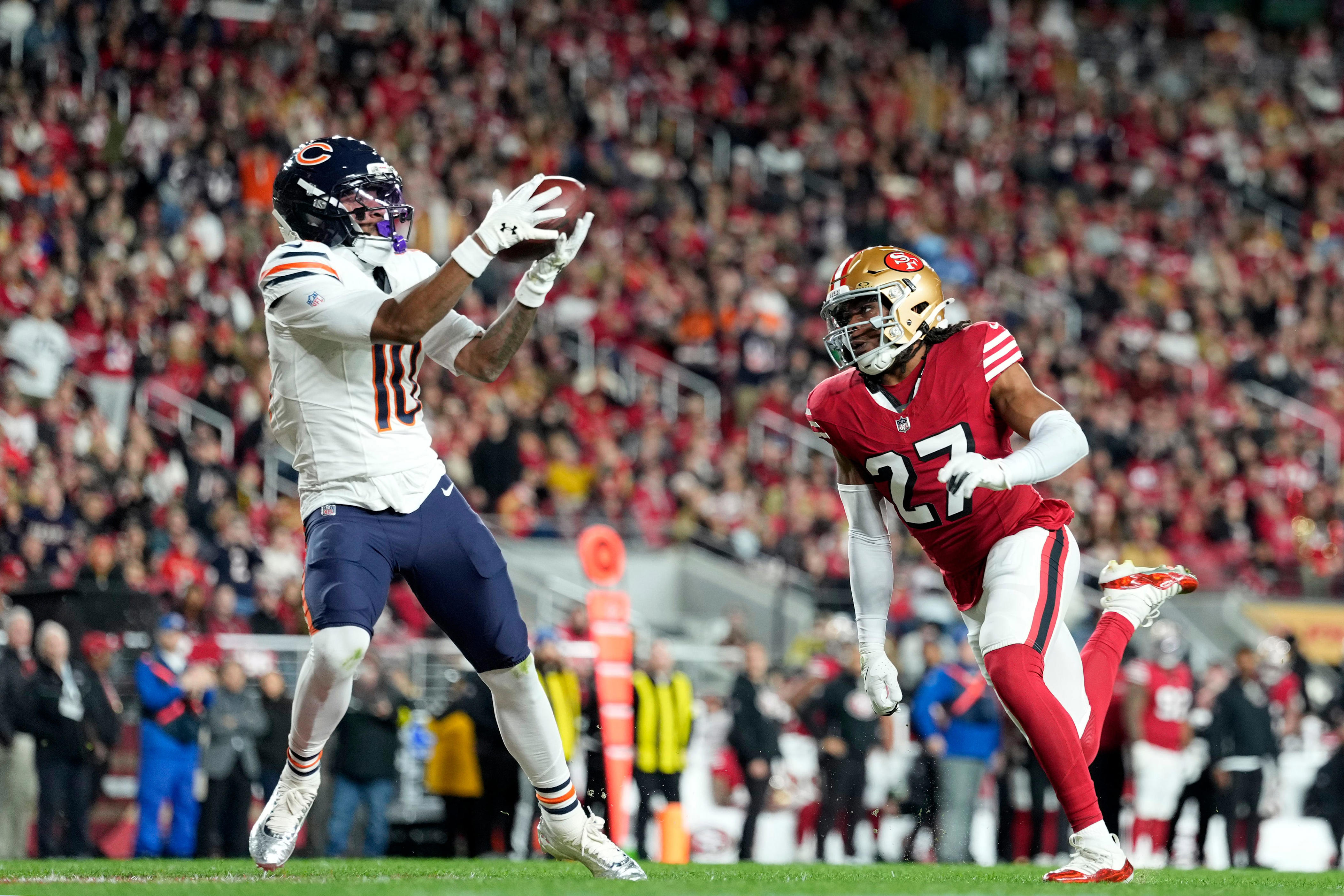 Dec 28, 2025; Santa Clara, California, USA; Chicago Bears wide receiver Luther Burden III (10) makes a catch to score a touchdown against the San Francisco 49ers in the first half at Levi's Stadium. Mandatory Credit: Kyle Terada-Imagn Images
