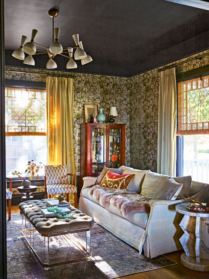 Moody living room with wallpapered walls