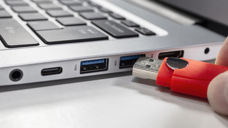 USB port in laptop showing blue