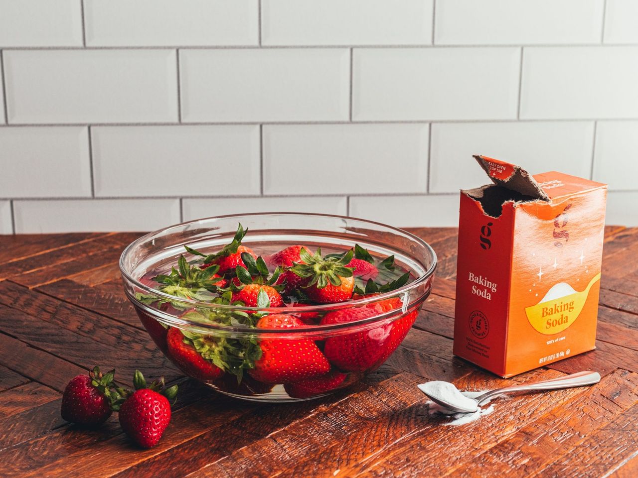 strawberries in bowl of water with baking soda