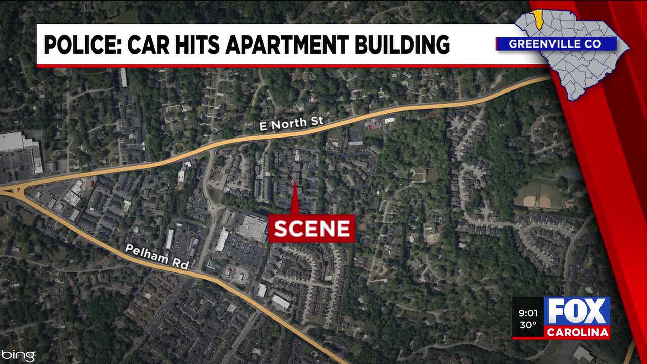 Police investigating after vehicle hit apartment building in Greenville