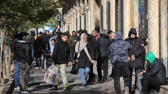 Iran erupts into fresh protests as currency falls to record low ...