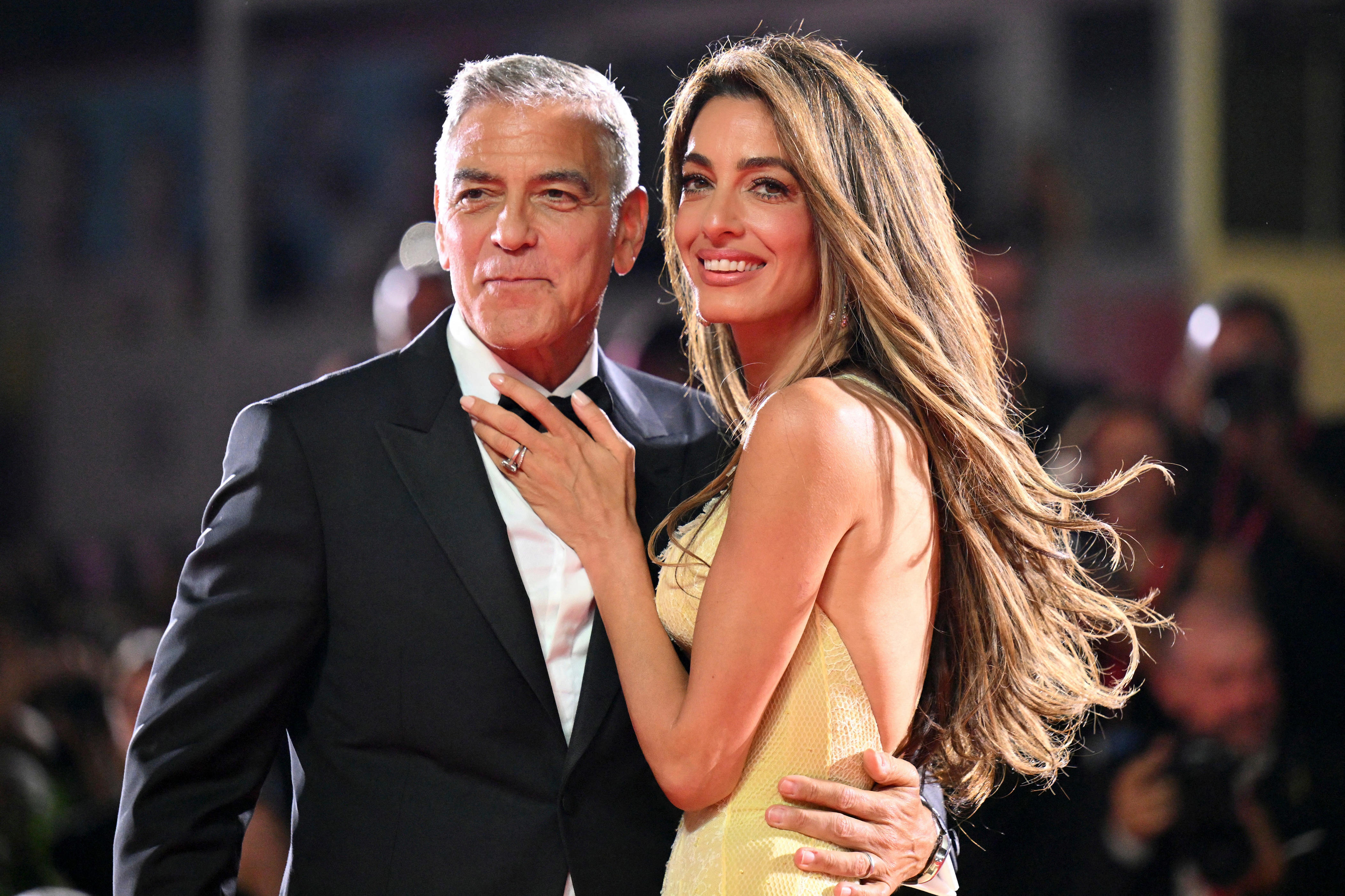 See George Clooney and Amal's romance and political work