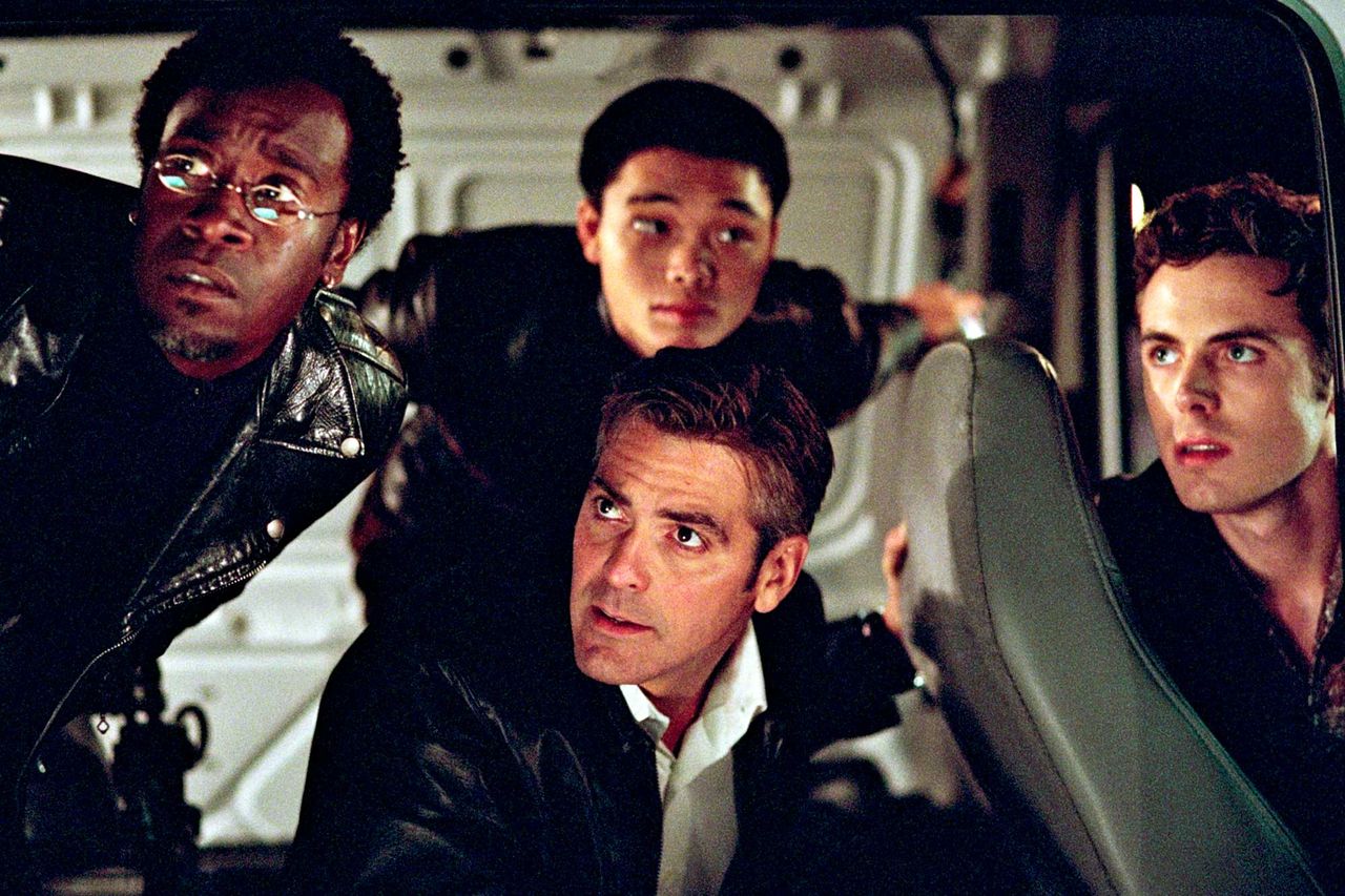 Bob Marshak/Warner Bros. Don Cheadle, Shaobo Qin, George Clooney, and Casey Affleck in 'Ocean's Eleven'