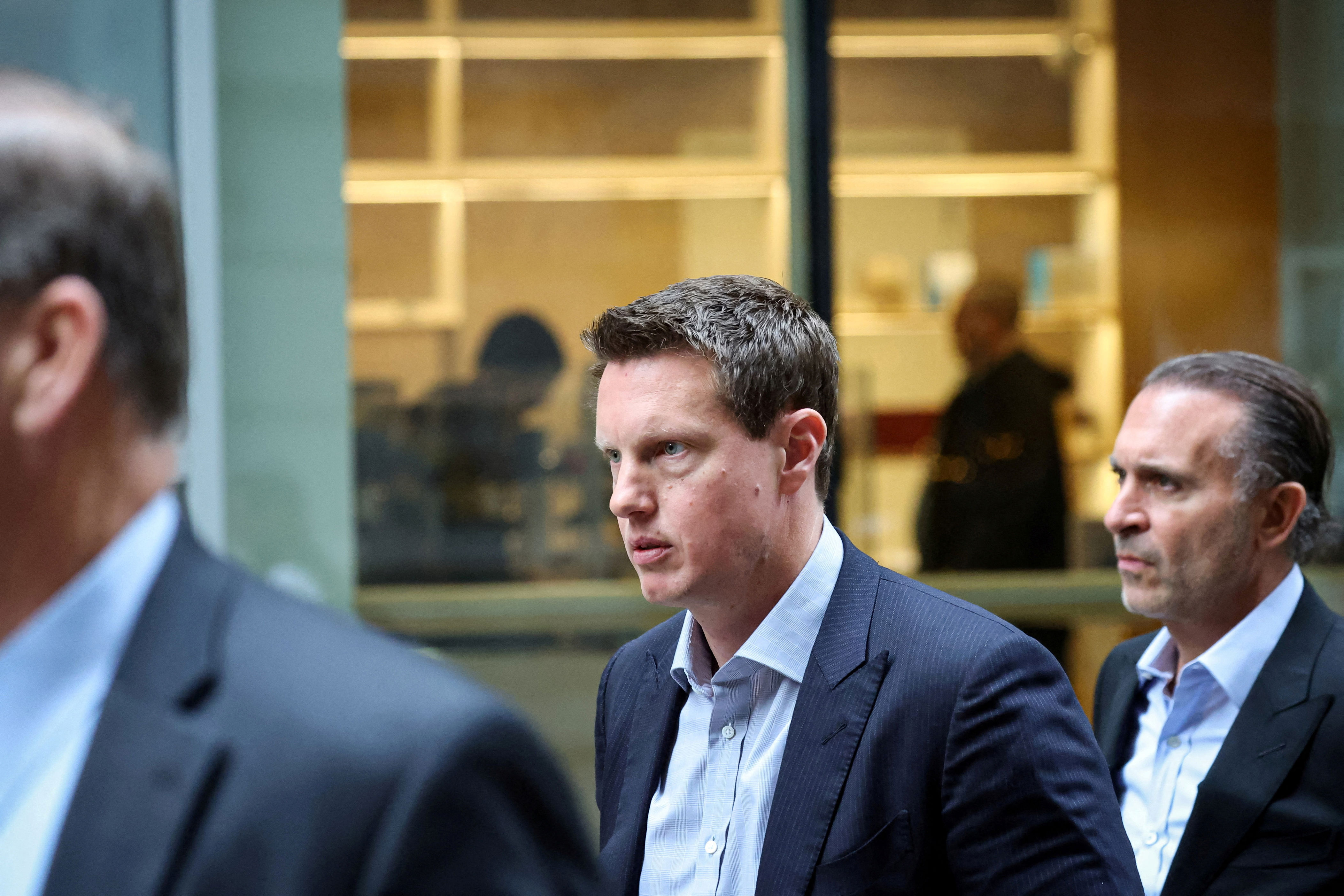 David Ellison, CEO of Paramount Skydance, exits following an interview at the New York Stock Exchange in New York City, U.S., December 8, 2025. REUTERS/Brendan McDermid