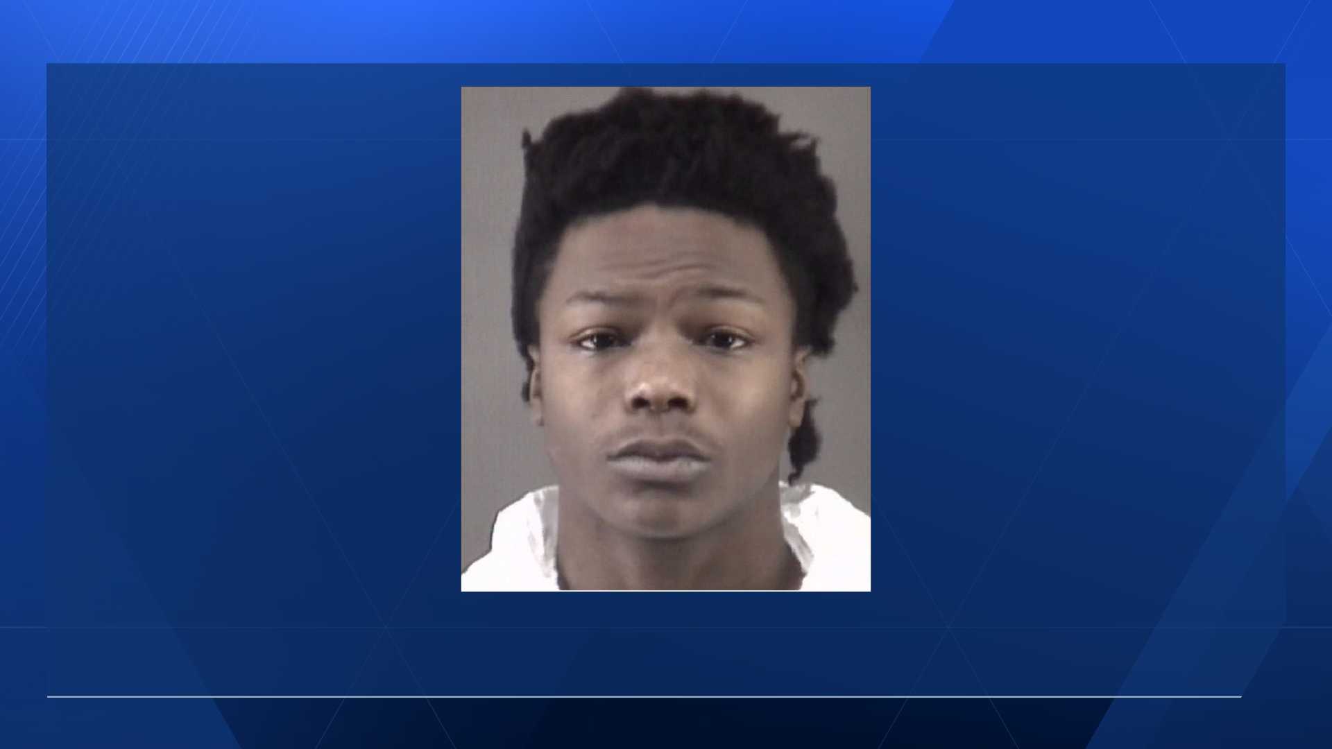 Teenager arrested after shots fired at police officer