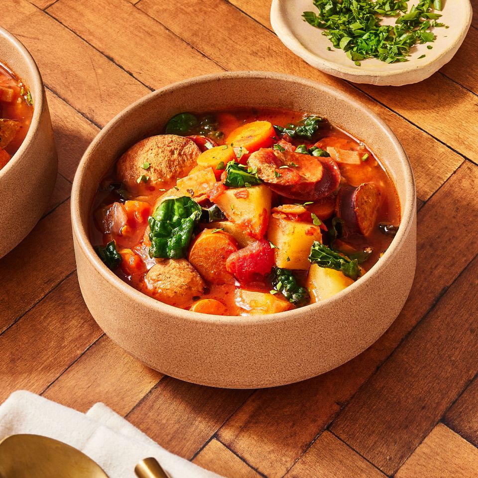 a recipe photo of the Kale Sausage Stew served in a bowl