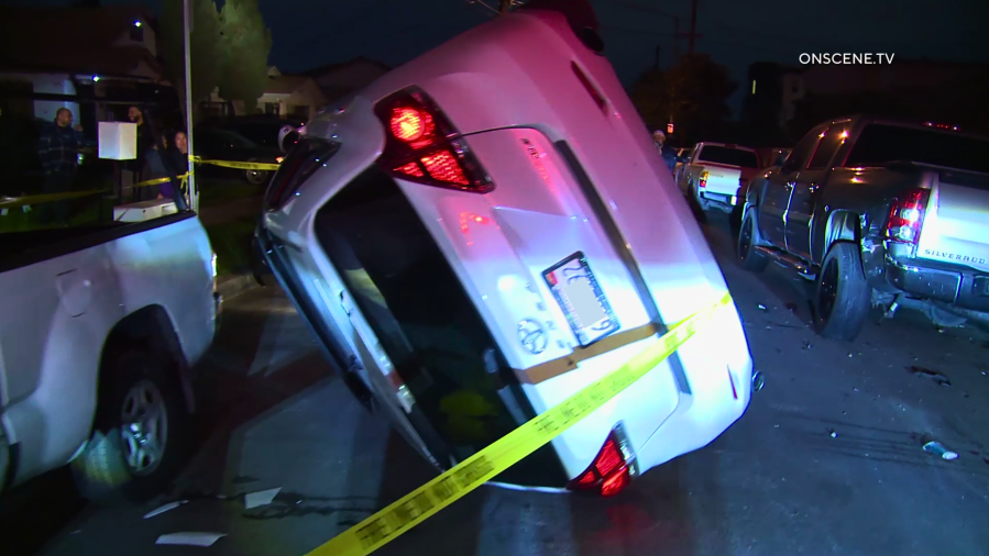 Woman arrested after car overturns in Los Angeles neighborhood<br>