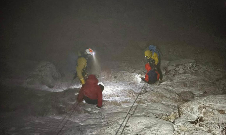 Hikers wearing jogging bottoms and trainers rescued after climbing ...