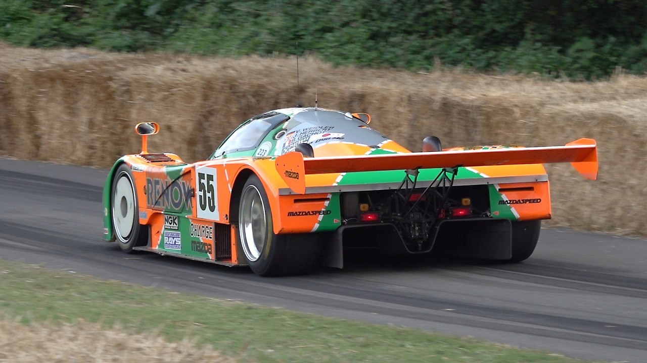 Classic Mazda 787B pushing through a high speed course