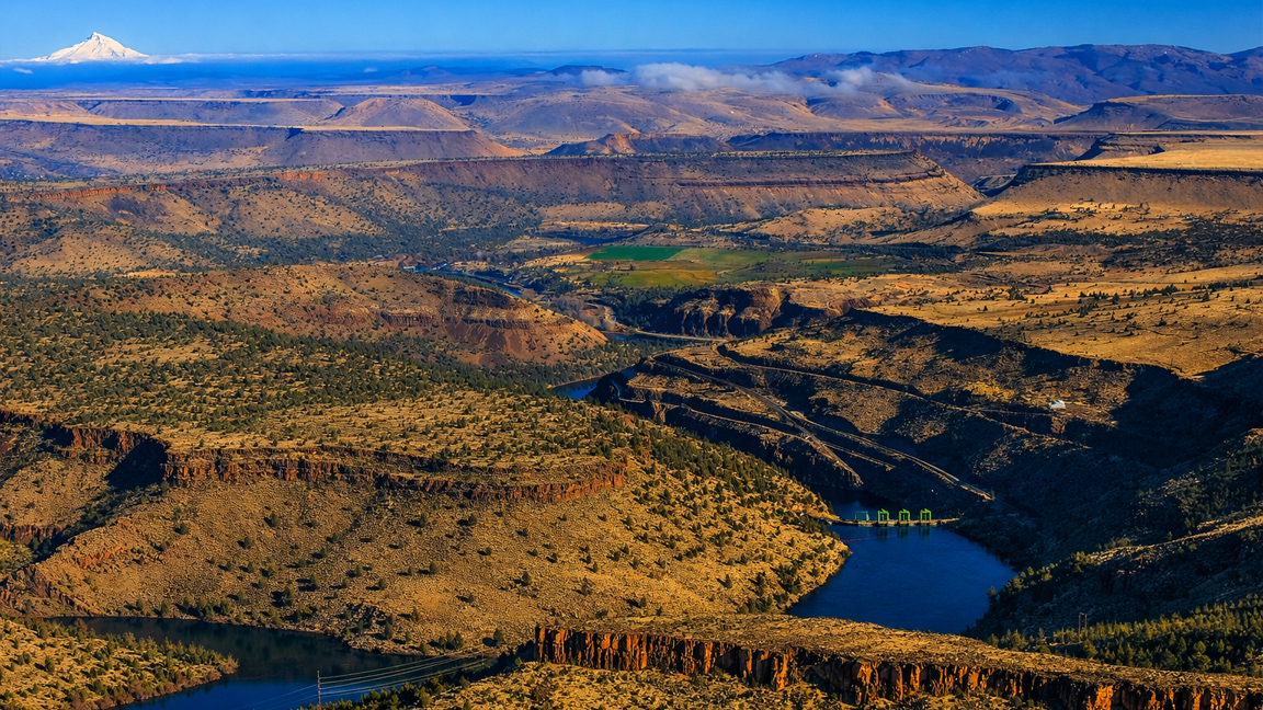 Desert valleys meet blue river curves