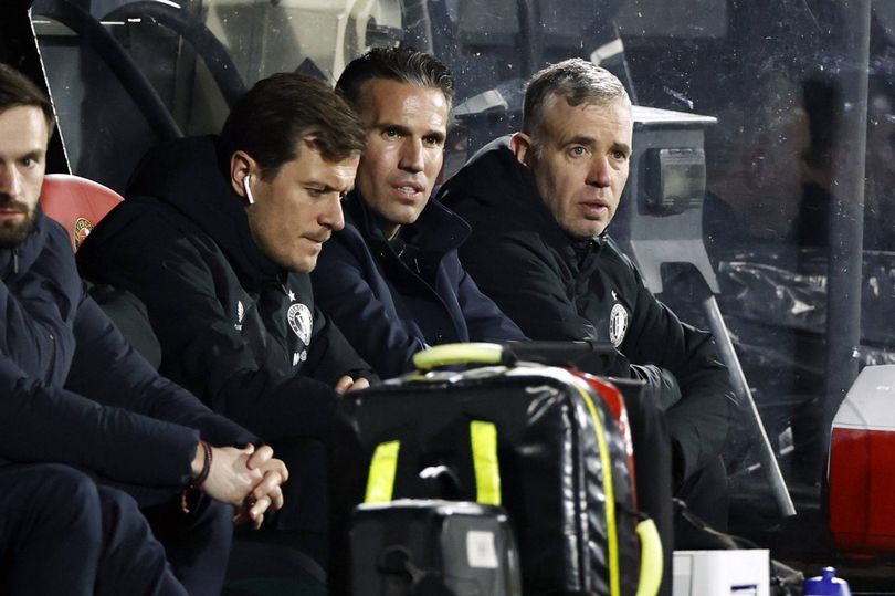 Feyenoord assistant coach Etienne Reijnen, Feyenoord coach Robin van Persie, Feyenoord assistant coach Rene Hake during the Dutch Eredivisie match between Feyenoord and NEC at Feyenoord Stadium de Kuip