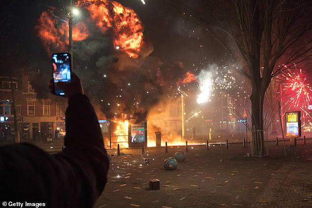 Netherlands New Year chaos sees two killed by fireworks as thugs battle ...