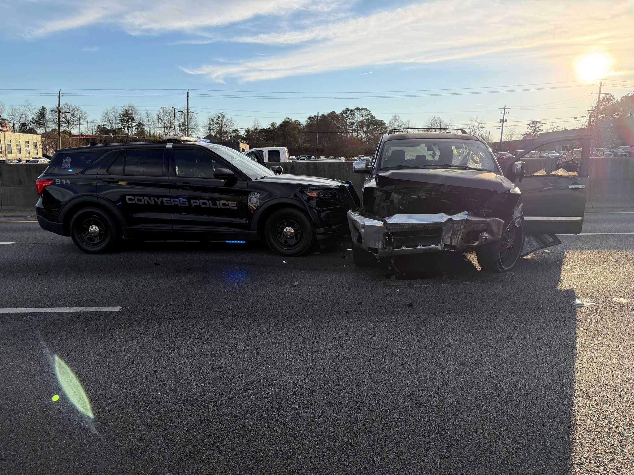 Officer injured after being dragged by vehicle during New Year