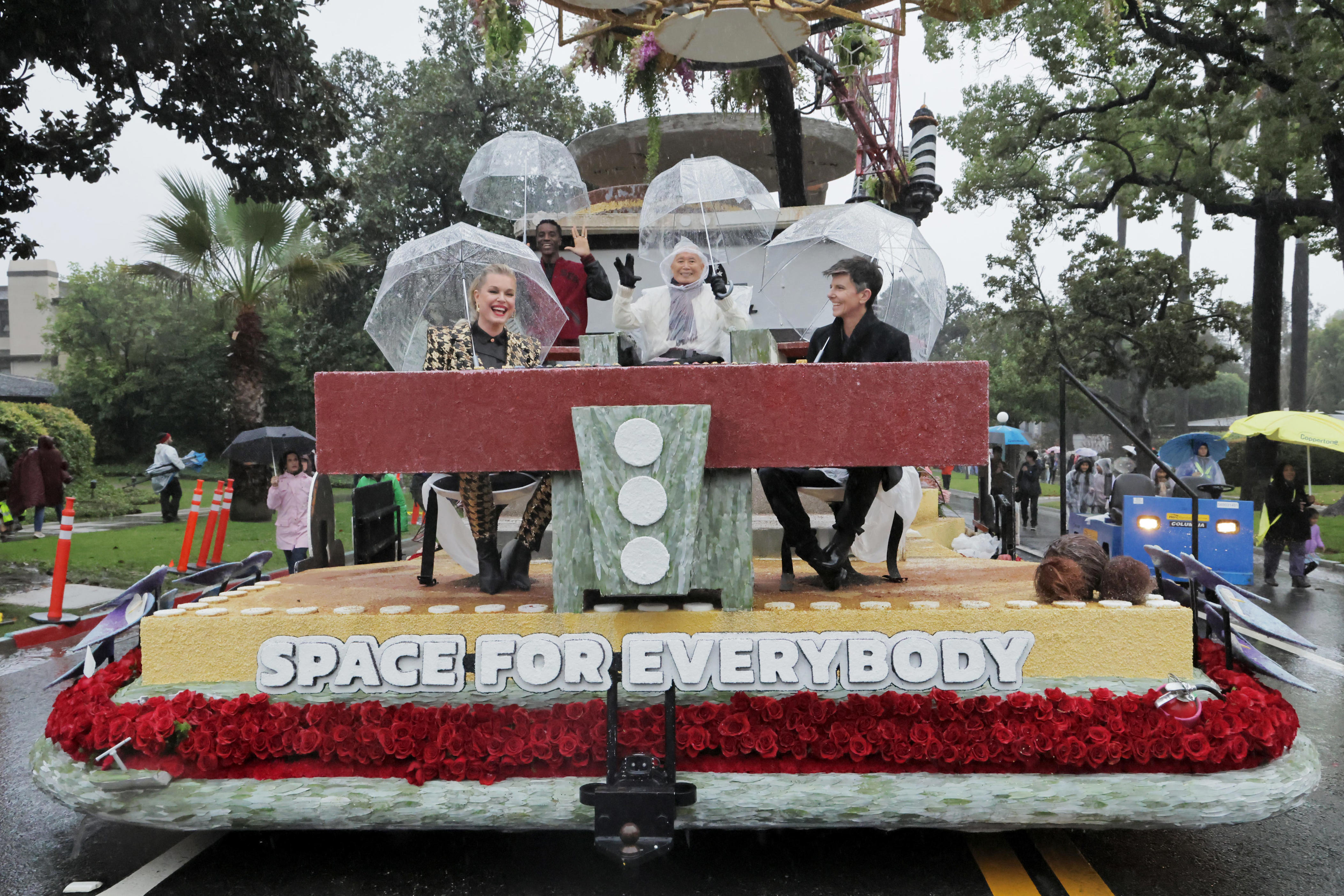 Thousands of spectators attended the Rose Parade despite rain