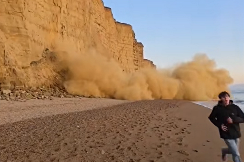 Warning after huge cliff fall at popular beach