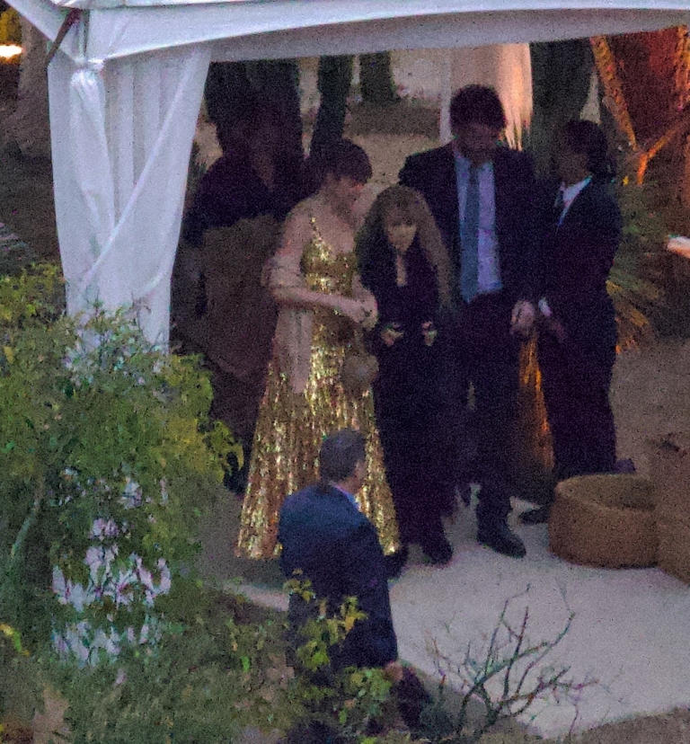 Bride-to-be Taylor Swift looks like a golden goddess as she rings in ...