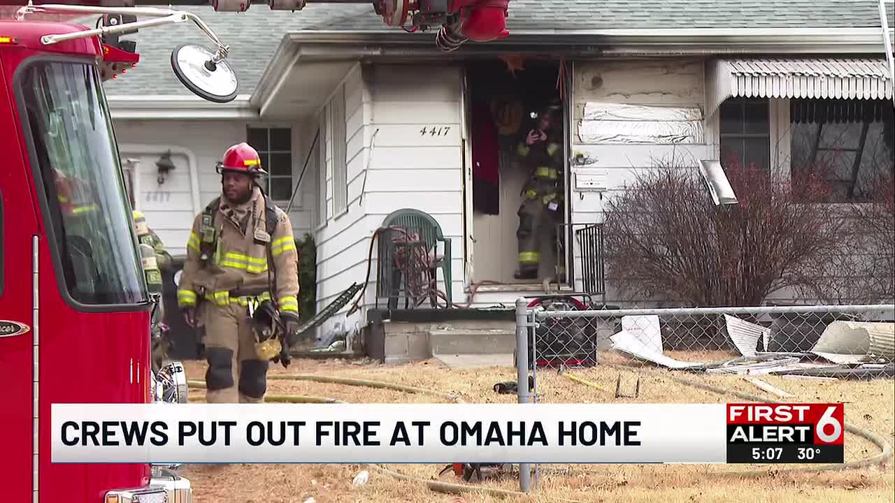 Omaha house fire at 54th, Ames results in arrest